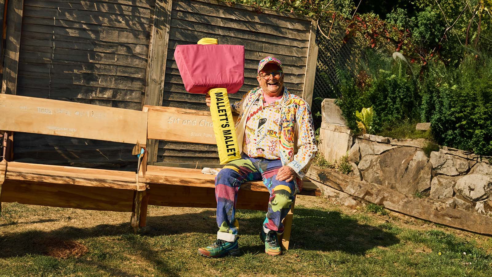 Timmy Mallet seating on bench
